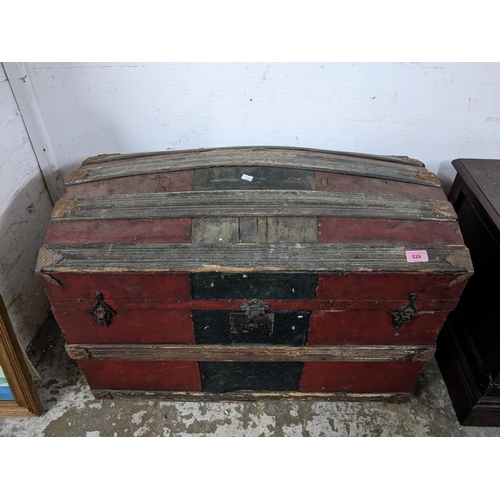 211 - A mixed lot of furniture to include a partially leather clad wooden domed top trunk, an Old Charm TV... 