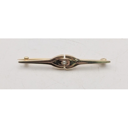 103 - A gold bar brooch tested as 15ct gold set with a central diamond 3.4g
Location :CAB6
If there is no ... 