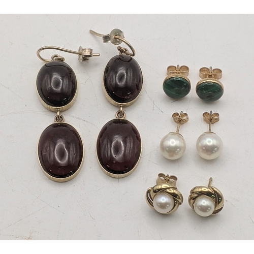 106 - Four pairs of gold earrings to include a pair of a 9ct gold and malachite stud earrings, a pair of 9... 