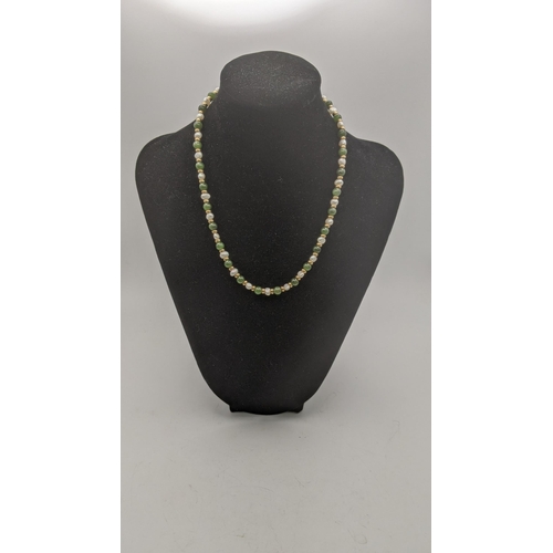 107 - A 9ct gold pearl and jadeite necklace 17.4g, 40cm l
Location:CAB8

If there is no condition report s... 