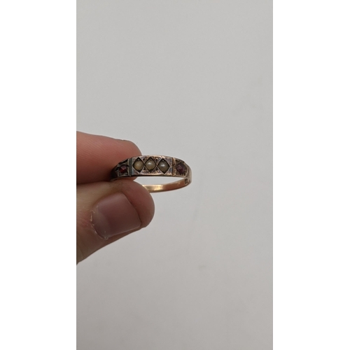 109 - Two gold ladies rings to include a Victorian ring set with seed pearls, stamped 585, 1.1g together w... 