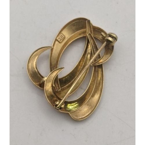 110 - An 8ct gold classic swirls and waves brooch, 2.4g
Location:CAB2

If there is no condition report sho... 