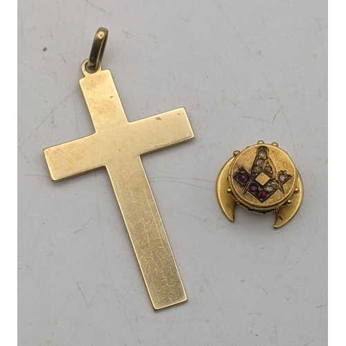 112 - A gold cross pendant tested as 9ct gold 3.6g, together with a gold masonic stud tested as 14ct, 2.7g... 