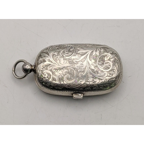 116 - A silver sovereign case having an engraved floral design, hallmarked Birmingham 1909, 31.8g
Location... 