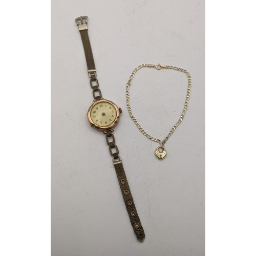 123 - A 9ct gold ladies wristwatch A/F on a later strap, 15.8g, together with a 9ct gold bracelet with a l... 