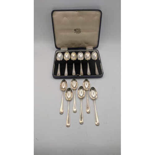 125 - Silver teaspoons to include two sets of six, one set hallmarked Sheffield 1921 and the other hallmar... 