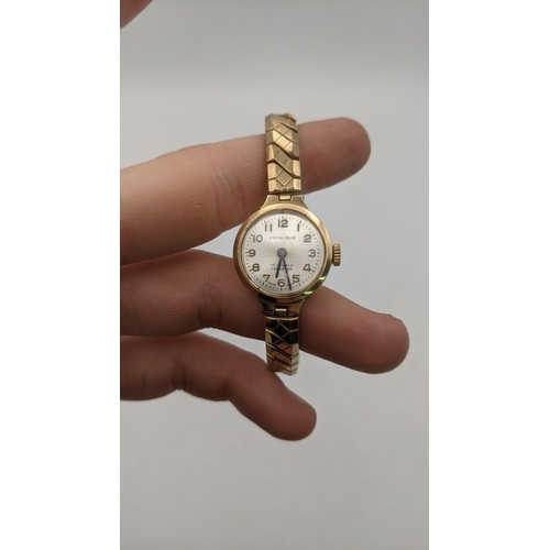 126 - A 9ct gold ladies Excalibur manual wind wristwatch on an expanding strap
Location:CAB7

If there is ... 