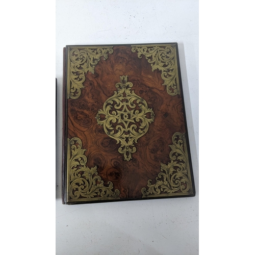 130 - A mixed lot to include a Victorian papier mache and Mother of Pearl document folder, together with a... 