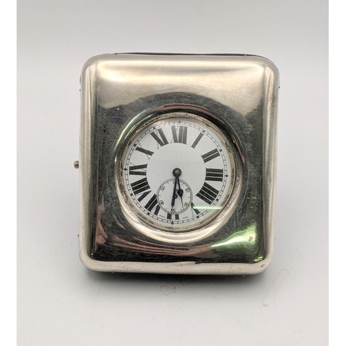 131 - An early 20th century Goliath pocket watch with a silver fronted travel case, hallmarked Birmingham ... 