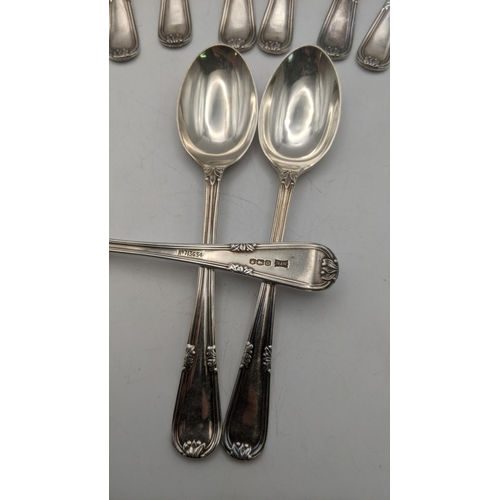 136 - A set of ten silver Walker & Hall tea spoons, hallmarked Sheffield 1931, total weight 198.6g
Locatio... 