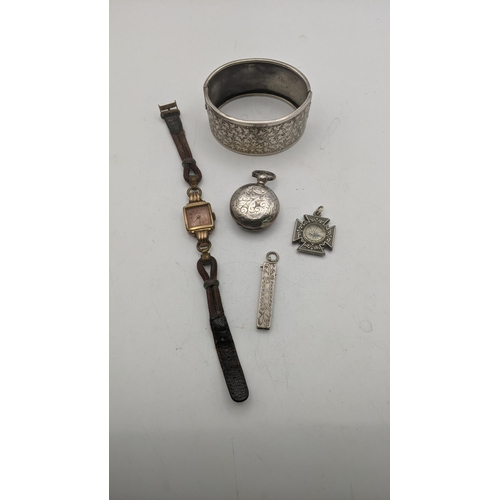 137 - Silver to include a pocket watch case, a propelling pencil also as a pendant, a white metal bangle w... 