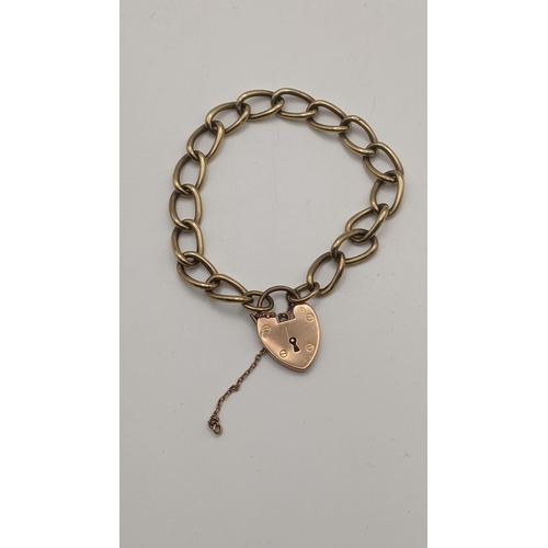 159 - A 9ct gold bracelet having a love heart shaped padlock clasp 8.8g
Location:CAB8
If there is no condi... 