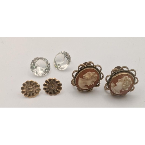 169 - Two pairs of gold earrings to include a pair of 9ct gold cameo earrings and a pair of daisy earrings... 