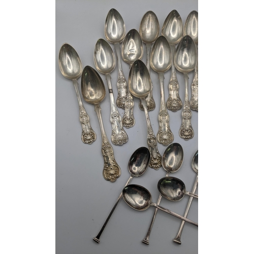 173 - Silver spoons to include a set of 13 fiddle pattern tea spoons to include 7 of them hallmarked Glasg... 