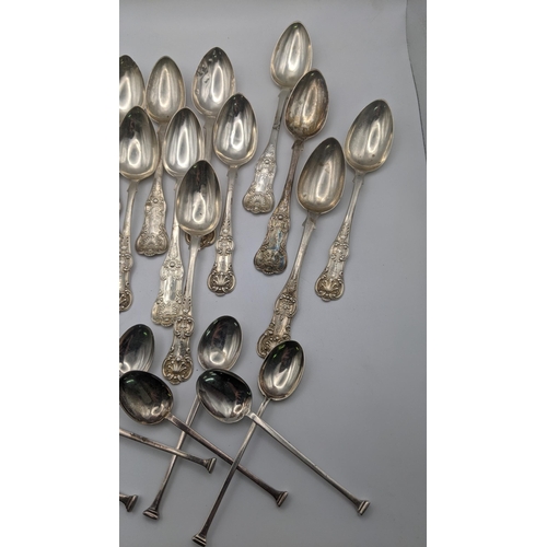 173 - Silver spoons to include a set of 13 fiddle pattern tea spoons to include 7 of them hallmarked Glasg... 