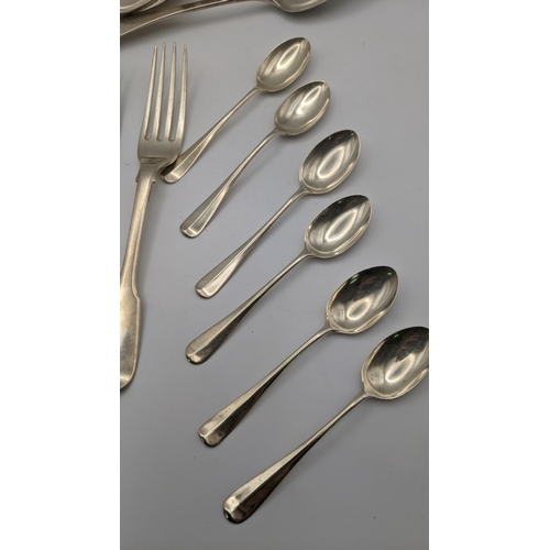 177 - Silver and silver plate to include two silver fiddle pattern forks, a set of six tea spoons, a table... 