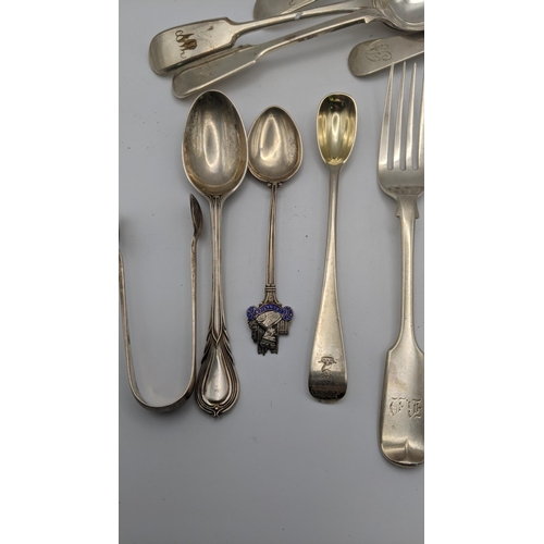 177 - Silver and silver plate to include two silver fiddle pattern forks, a set of six tea spoons, a table... 