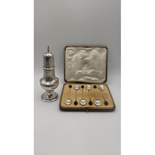 179 - Silver to include a sugar coaster hallmarked London 1800, together with a set of six coffee spoons i... 