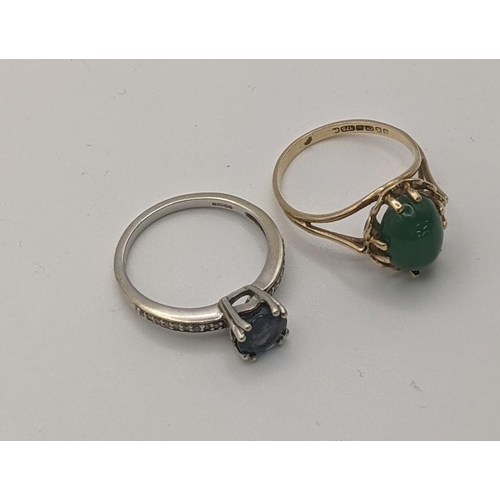 184 - A 9ct gold ring set with a jade cabouchon and a white 9ct gold ring, 4.9g
Location: RING

If there i... 