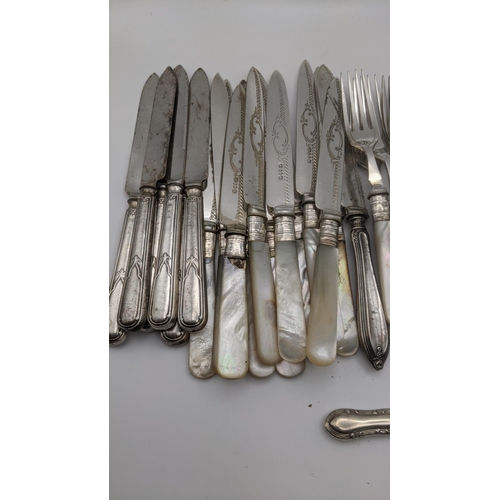 188 - Mother of pearl handled dessert knives with silver ferrules, seventeen silver handled knives and a s... 