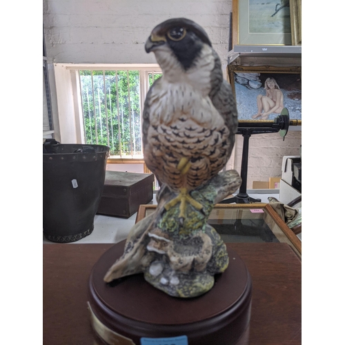 198 - Three Royal Doulton Figures to include 'Peregrine Flacon' with stand and certificate, Flambe and 'Su... 