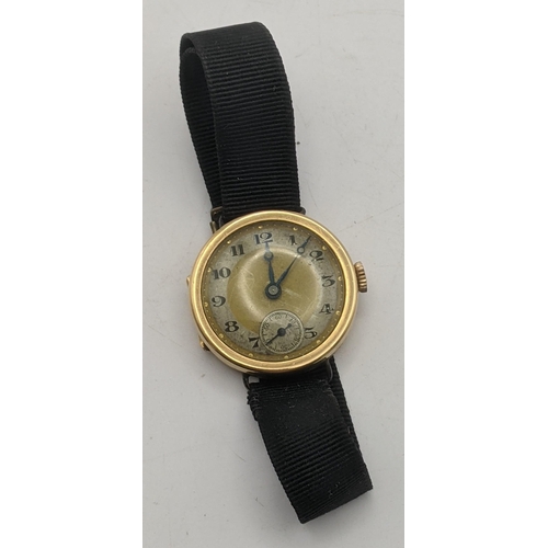 22 - An 18ct gold ladies wrist watch on a fabric strap, total weight 15.1g
Location:CAB7
If there is no c... 