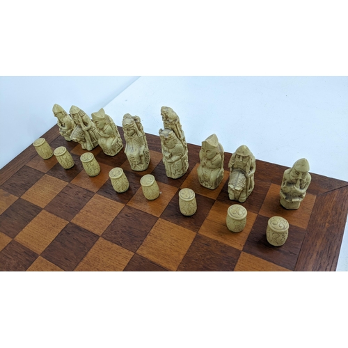 233 - A mid/ late 20th century Resin chess set on an oak board
Location: 9-4
If there is no condition repo... 