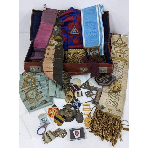 236 - A collection of masonic regalia to include a Victorian silver badge dated 1851 and others, various r... 