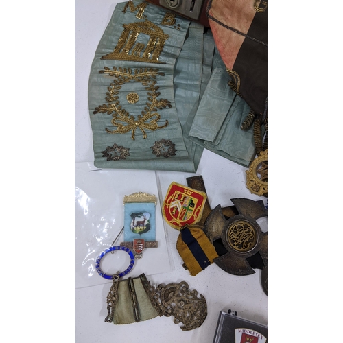 236 - A collection of masonic regalia to include a Victorian silver badge dated 1851 and others, various r... 