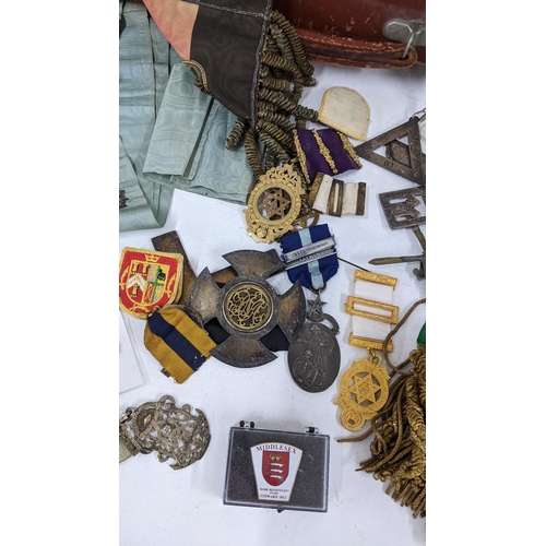 236 - A collection of masonic regalia to include a Victorian silver badge dated 1851 and others, various r... 