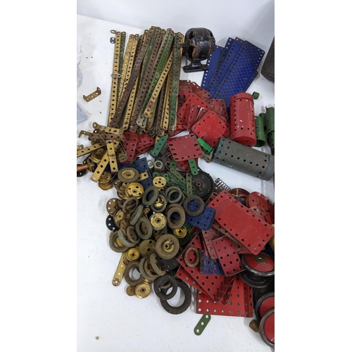 240 - A large collection of loose Meccano to include parts for outfit No5 with instructions
Location: A3M
... 