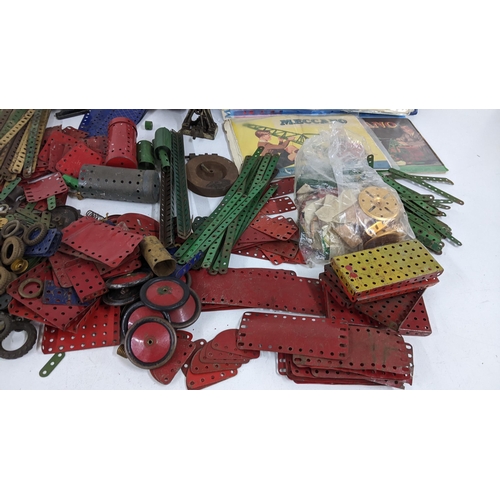 240 - A large collection of loose Meccano to include parts for outfit No5 with instructions
Location: A3M
... 