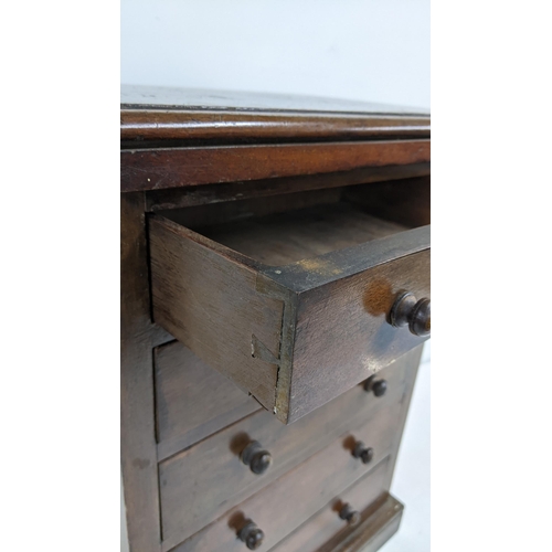 241 - A Victorian mahogany table top collectors chest of five drawers, 50.5cm h x 36.5cm w
Location: A2F

... 