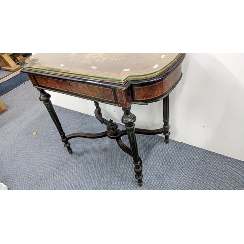 243 - A late Victorian aesthetic marquetry inlaid walnut and ebonized side table having a single drawer an... 