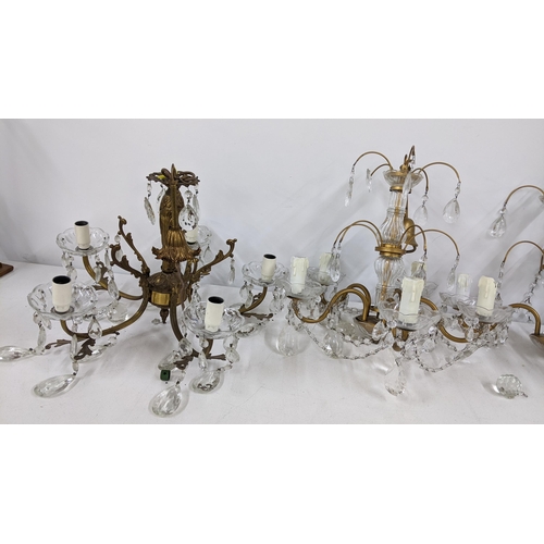 244 - Four mid 20th century gilt metal hanging crystal drop chandeliers
Location: A1B

If there is no cond... 