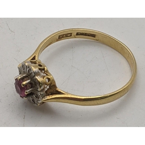 26 - An 18ct gold ring set with ruby and diamonds 2.8g
Location:RING
If there is no condition report show... 