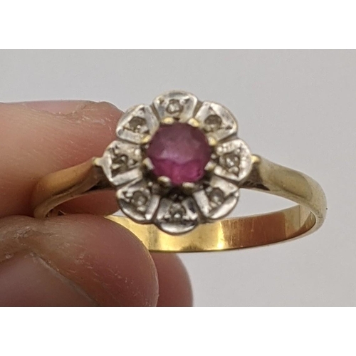 26 - An 18ct gold ring set with ruby and diamonds 2.8g
Location:RING
If there is no condition report show... 