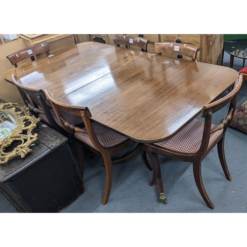 302 - A set of six Regency mahogany bar back dining chairs together with a reproduction dining table with ... 