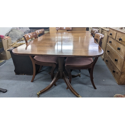 302 - A set of six Regency mahogany bar back dining chairs together with a reproduction dining table with ... 