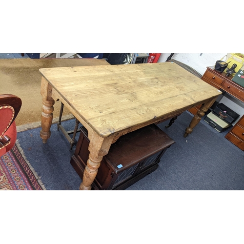 303 - A reclaimed pine farmhouse table on four turned legs, 76cm h x 193cm w
Location: RAB

If there is no... 