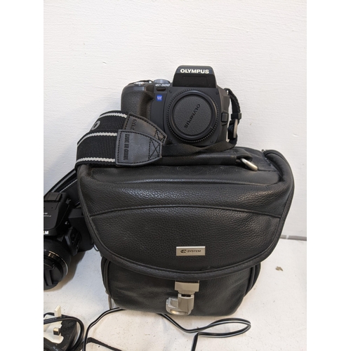 327 - Digital photography equipment and accessories to include an Olympus E-500, a Fujifilm Finepix S1, tw... 