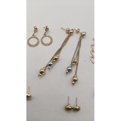 52 - Five pairs of 9ct gold stud earrings together with two yellow metal pairs of earrings tested as 9ct ... 