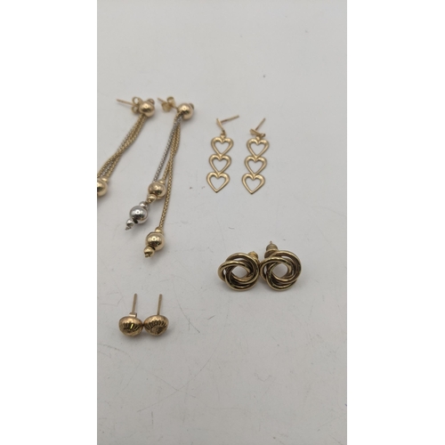 52 - Five pairs of 9ct gold stud earrings together with two yellow metal pairs of earrings tested as 9ct ... 