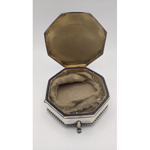 60 - A silver dressing table ring box on four paw feet hallmarked Birmingham 1915 181.4g
Location:R2.3
If... 