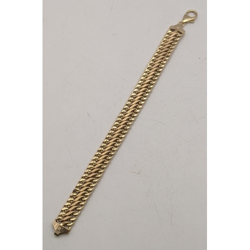 67 - A 9ct gold broad link bracelet 11.9g
Location:CAB3
If there is no condition report shown, please req... 