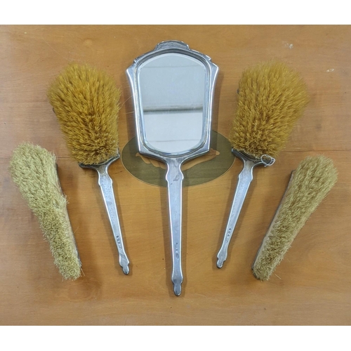 74 - A set of five silver and enamelled dressing table items, to include a hand mirror and 4 brushes hall... 