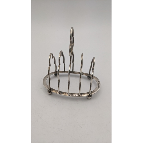 76 - A silver toast rack hallmarked Birmingham 1894, 58.3g
Location:T
If there is no condition report sho... 