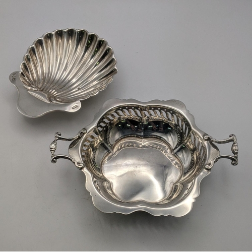 78 - Two silver items to include a shell shaped butter dish along with a twin handled dish with pierced b... 