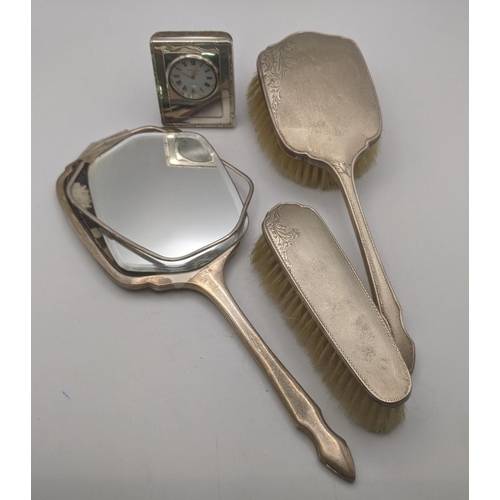 79 - Mixed silver dressing table items to include a hand mirror A/F and two brushes along with a silver c... 