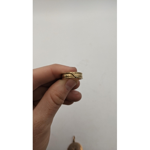 151 - A 9ct gold ring, 3.7g and a part gold coloured locket
Location:RING

If there is no condition report... 